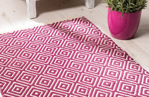 ABI geometric pure cotton rug in raspberry 60 x 90 cm